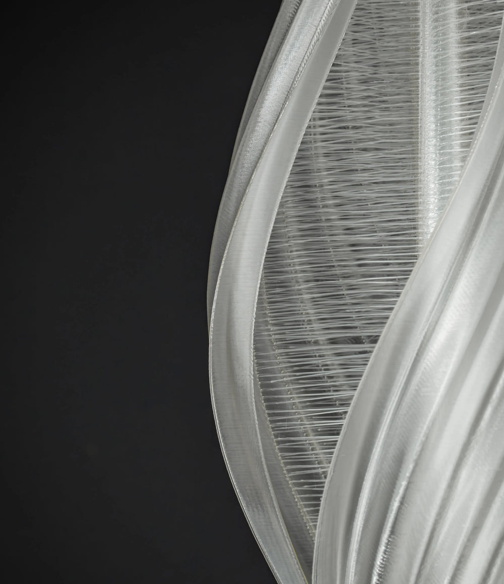Close detail of the Pupa lamp showing its fine printed lattice
