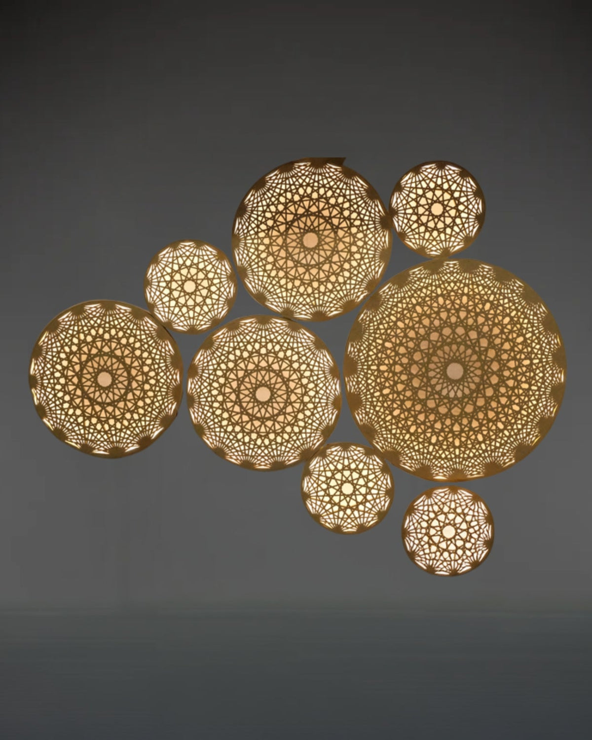 Aura Wall Art cluster of seven illuminated mandala pieces by Fab.Pub, 3D printed in London from plant-based bioplastic