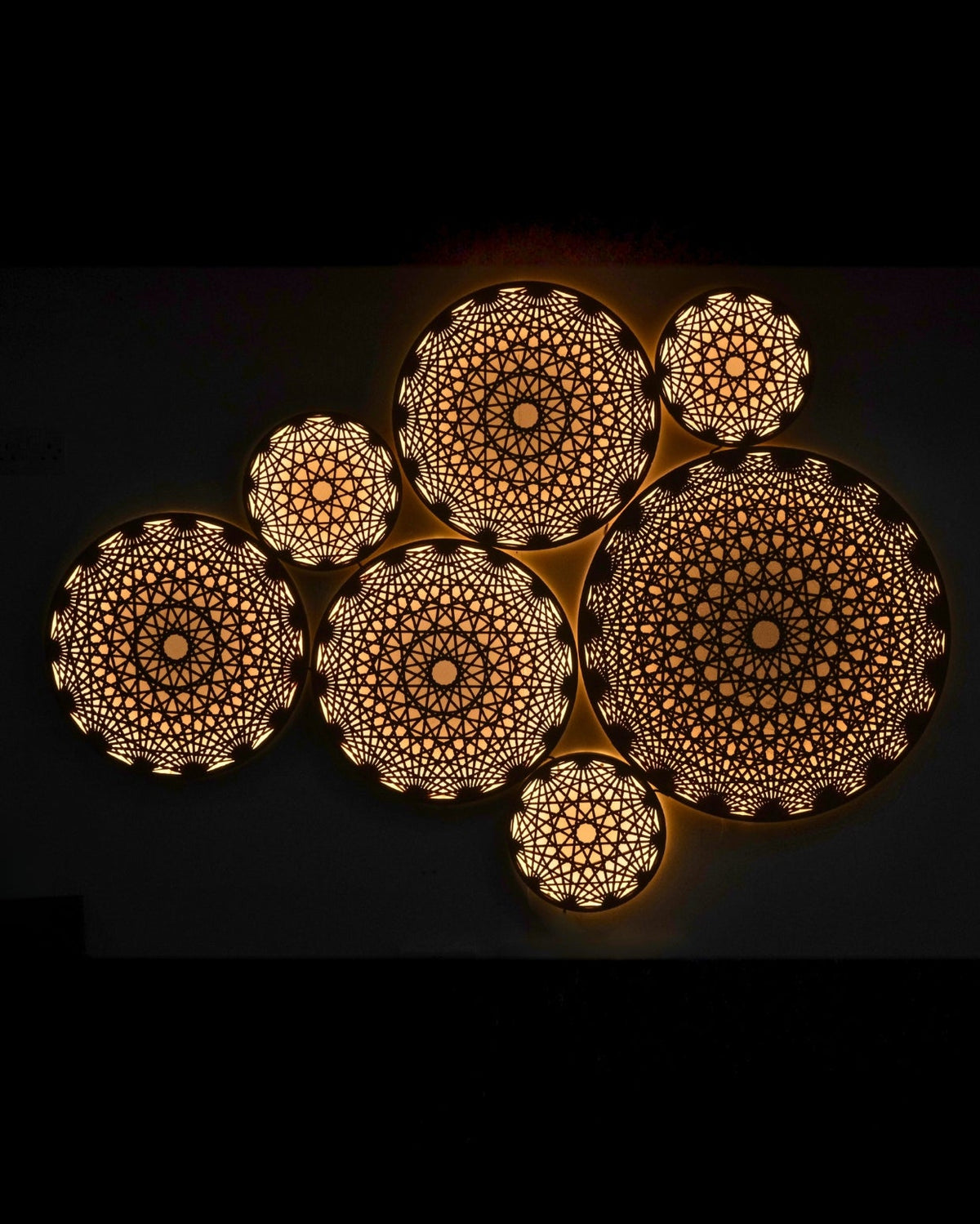 Aura Wall Art by Fab.Pub glowing on a large feature wall