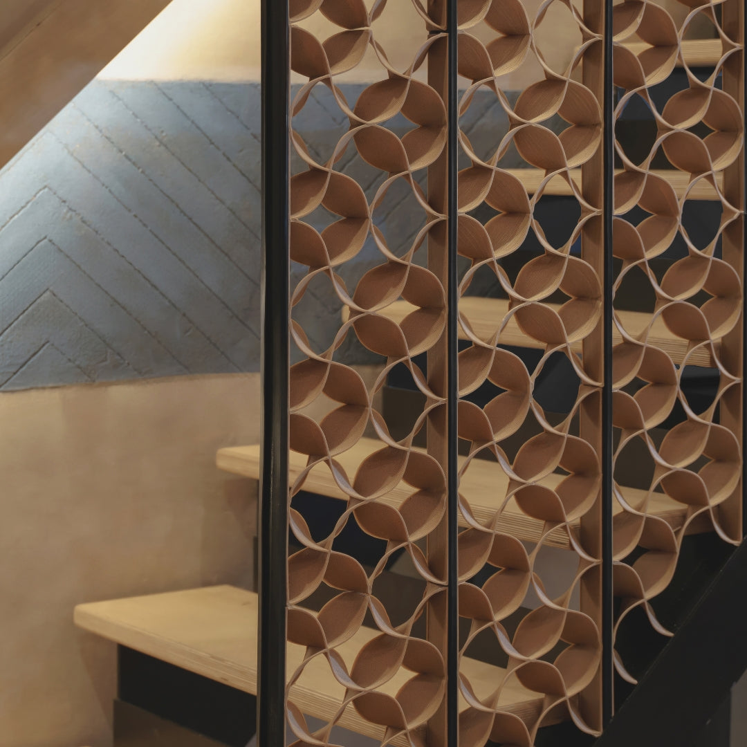 Butterfly panels installed alongside the Circular House staircase; frames excluded.